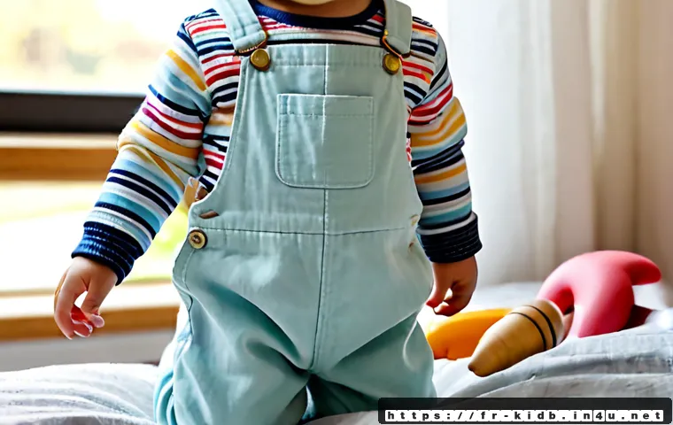 Home 17 해피랜드 유아복의 특징 - Photorealistic French nursery scene featuring a cheerful toddler wearing soft pastel cotton overalls...